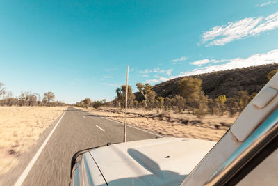 View of australian outback roads seen through passenger