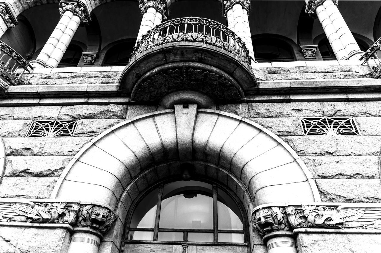 LOW ANGLE VIEW OF ORNATE HISTORIC BUILDING