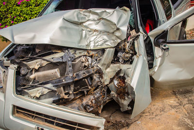 High angle view of garbage in abandoned car