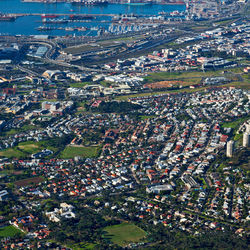 High angle view of houses and town in city