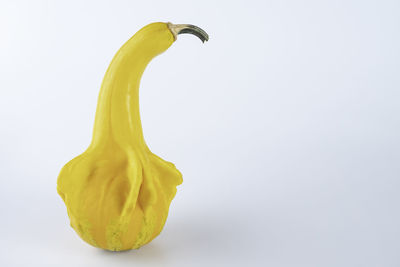 Close-up of yellow pepper against white background