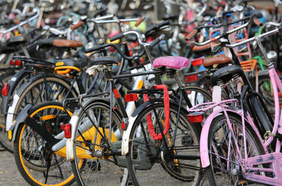Large parking lot with thousands of bikes in amsterdam in the netherlands