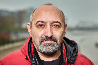 Portrait of man standing outdoors