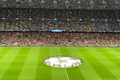 Group of people on soccer field