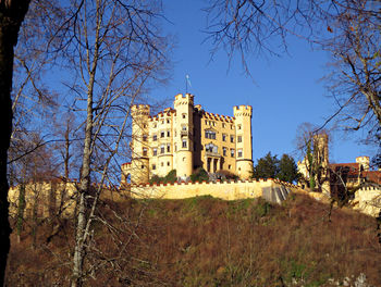 Low angle view of building against blue sky