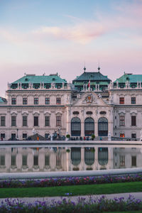 Buildings in city against sky