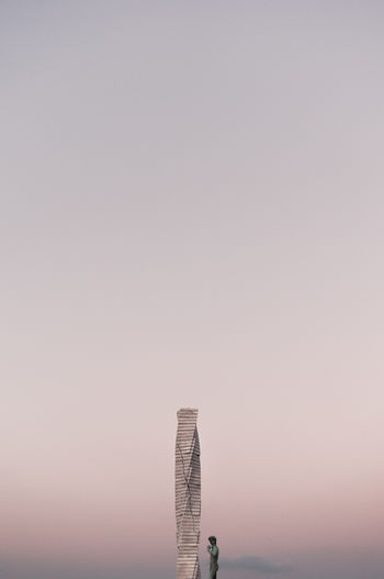 COMMUNICATIONS TOWER AGAINST SKY