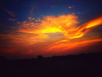 Scenic view of dramatic sky during sunset