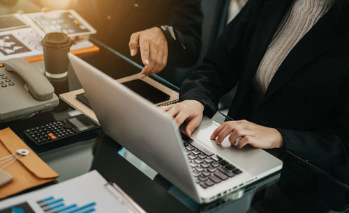 Man using laptop on table