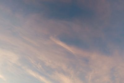 Low angle view of cloudy sky during sunset