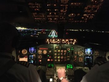 Close-up of airplane at night