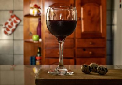 Close-up of wine glass on table