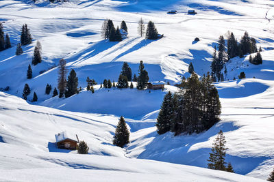 View of snow covered land and snowcapped mountain