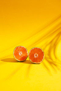 Close-up of oranges against orange background