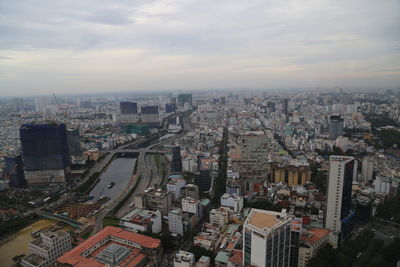 High angle view of modern buildings in city against sky