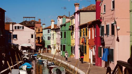 Panoramic view of buildings in city against sky
