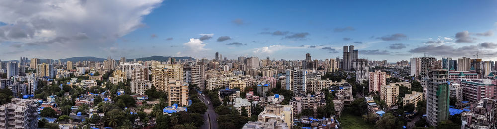 Panoramic view of city against sky