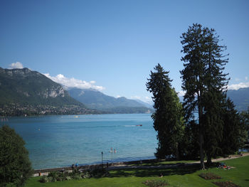 Scenic view of lake against clear blue sky