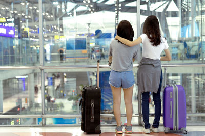 Rear view of women at airport