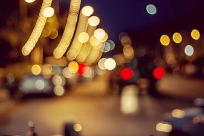 Defocused image of illuminated lights at night