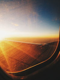 Aerial view of landscape seen through airplane window