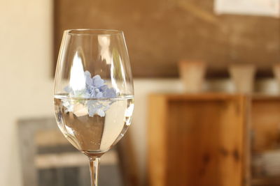 Close-up of wine glass on table