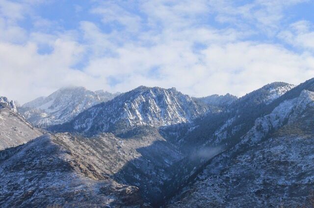 mountain, mountain range, snow, tranquil scene, winter, scenics, tranquility, cold temperature, beauty in nature, sky, landscape, cloud - sky, snowcapped mountain, nature, season, weather, non-urban scene, cloudy, idyllic, cloud