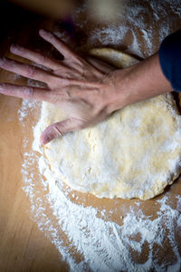 Cropped image of person preparing