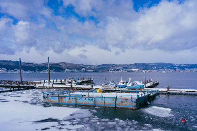 Boats moored in harbor