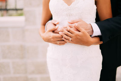 Couple embracing during wedding