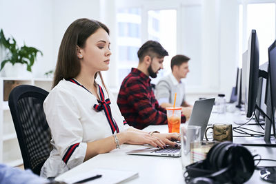 Business colleagues working at office