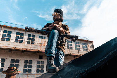 Low angle view of statue against building