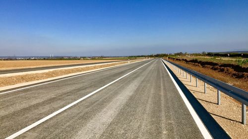 Road against clear sky