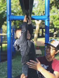 Full length of men playing at playground