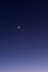 Low angle view of moon in sky