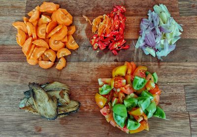 High angle view of chopped vegetables on cutting board