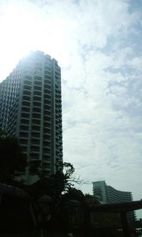 Low angle view of skyscrapers against sky