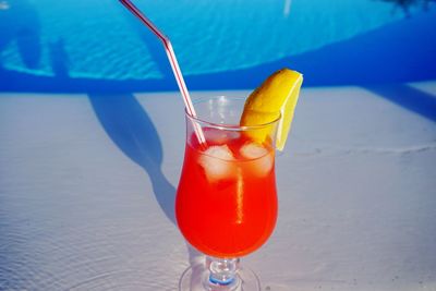 High angle view of drink against swimming pool