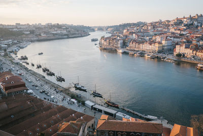 High angle view of river amidst buildings in city