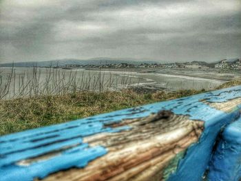 Wooden fence on grassy field