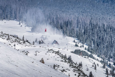 Scenic view of snow covered mountains