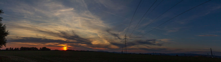 Silhouette landscape against sky during sunset