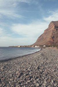 Surface level of beach against sky