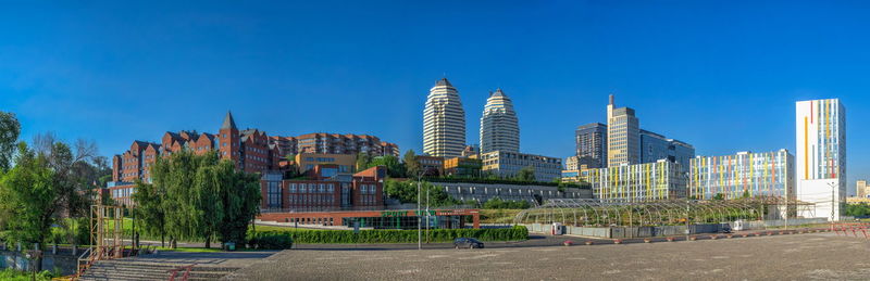 Modern buildings in the center of dnipro city in ukraine on a sunny summer day