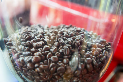 Close-up of coffee beans in glass