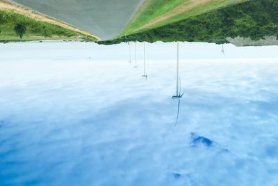 Scenic view of landscape against sky during winter