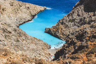 High angle view of rock formation at beach