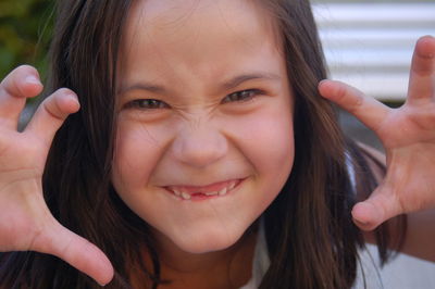 Close-up portrait of smiling girl