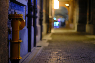 Close-up of illuminated lantern in city at night