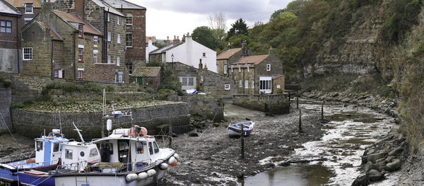 Boats moored in riverbed